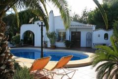 Two bedroom villa with sea views and private swimming pool within prestigious Puerto Blanco, Calpe