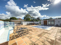 Exclusive Property with Three Charming Homes on One Plot in Coín