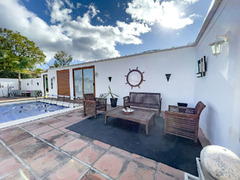 Exclusive Property with Three Charming Homes on One Plot in Coín