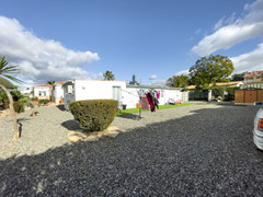 Exclusive Property with Three Charming Homes on One Plot in Coín