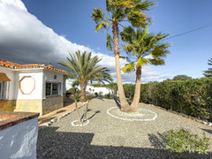 Exclusive Property with Three Charming Homes on One Plot in Coín