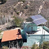Chalet y Exclusiva Ecoaldea Autosuficiente con Olivar Ecológico