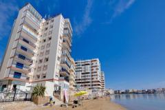 For sale stylishly renovated apartment directly on the beach in Torrevieja