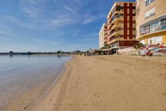 For sale stylishly renovated apartment directly on the beach in Torrevieja
