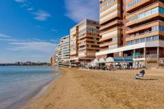 For sale stylishly renovated apartment directly on the beach in Torrevieja