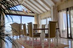 Contemporary-style villa with panoramic sea, golf and mountain views